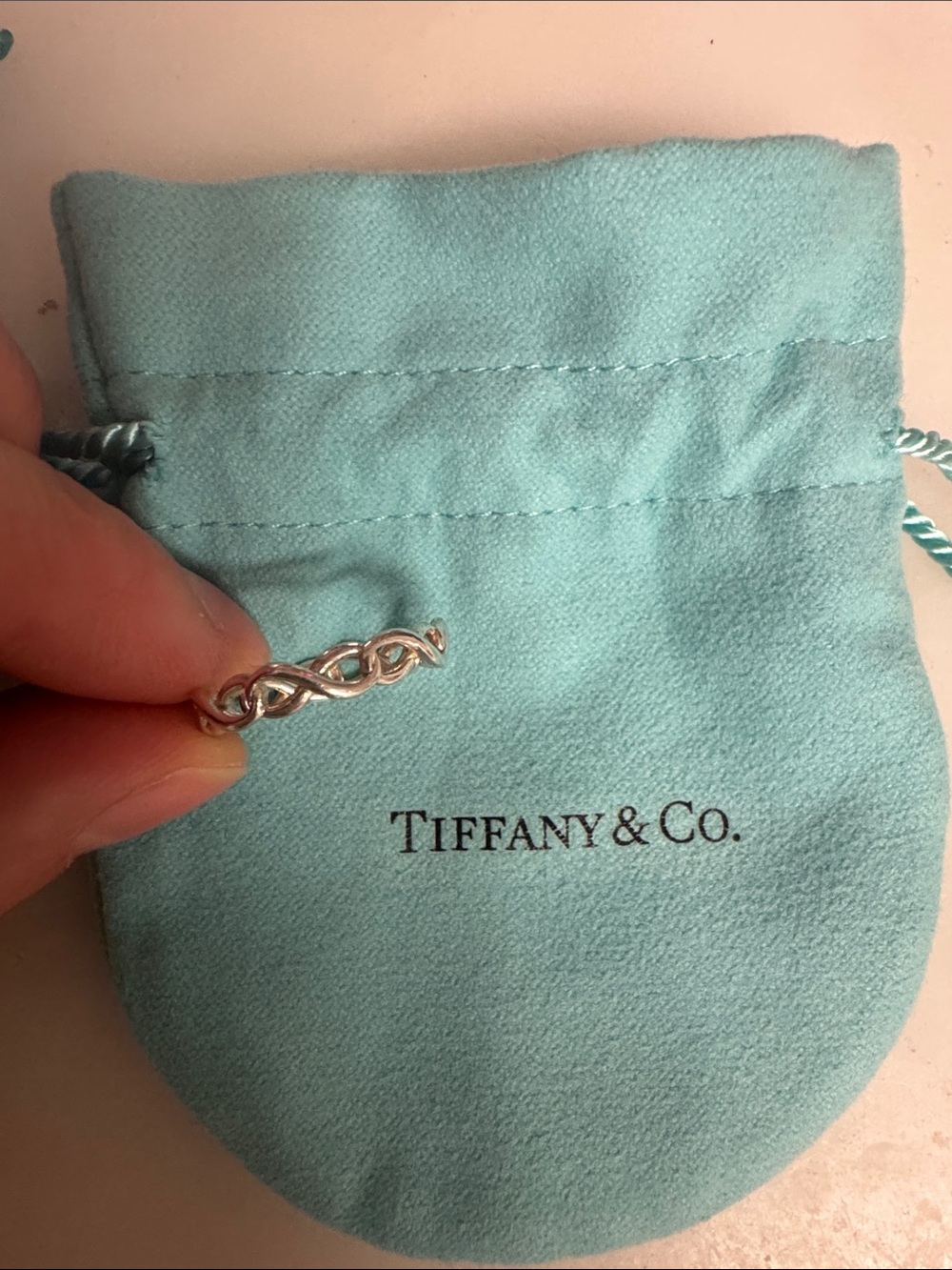 Tiffany & Co. Silver Infinity Twist Ring with Signature Blue Pouch